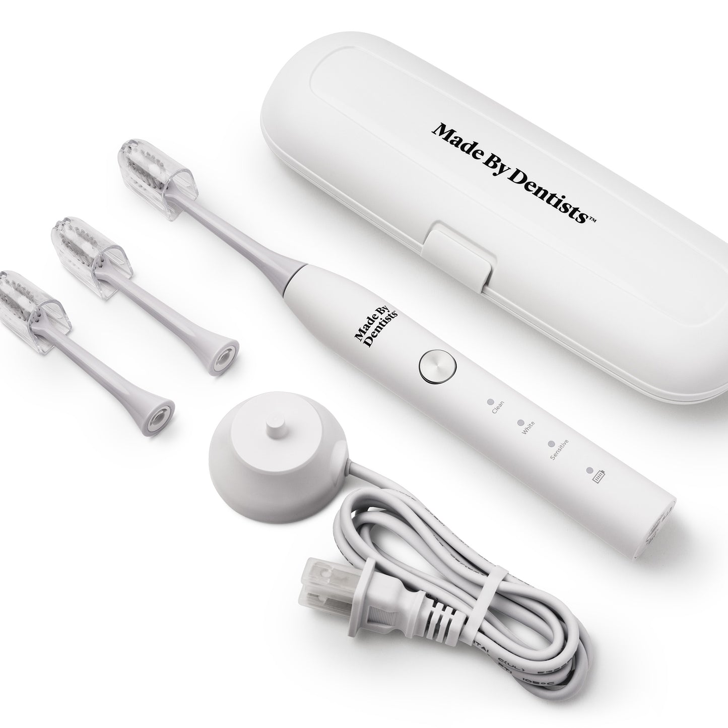 White Sonic Toothbrush with travel case, charger and replacement heads